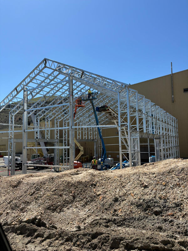 Custom 60’ x 100’ Dual Truss Triple Side Door Project with reinforced frames. 2024, Sugar Land, TX, U.S.A.