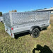 Variant 9’ Heavy Duty Utility Tilt Trailer with Ramp, 5’ x 9’ Inner Box, Mesh Side Extensions, MFR #: 754Tiltmesh, Made in Canada
